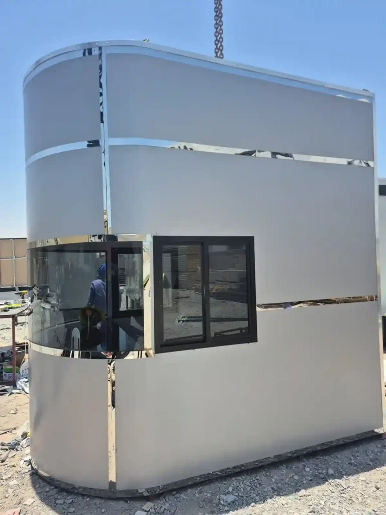 Front view of prefab curved security cabin with glass window